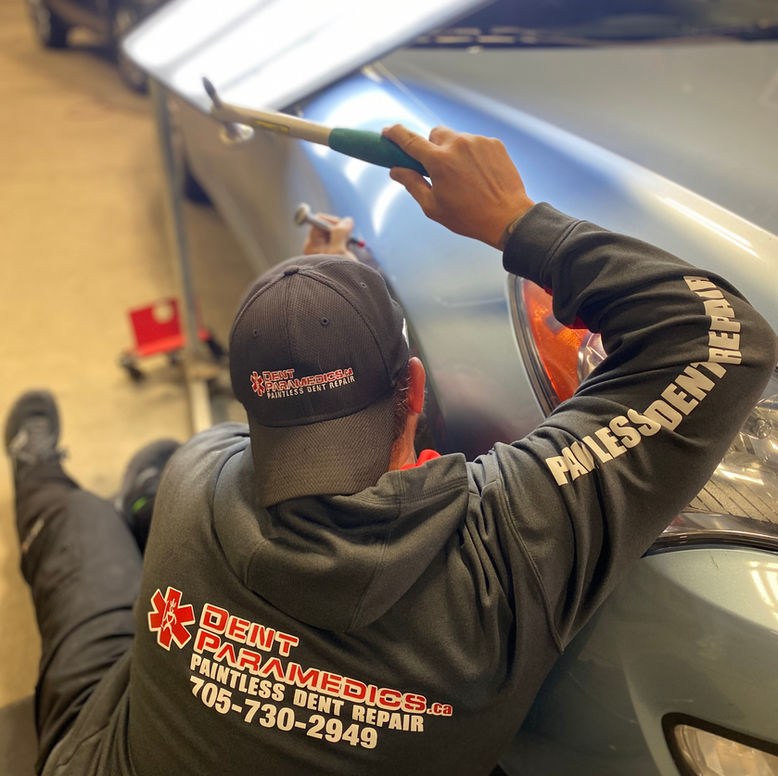 Jerry Fixing Dents